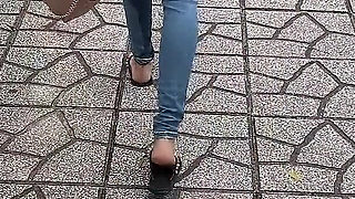Public Wetting Jeans in Park Near the Beach