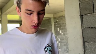 Two dudes fuck a Russian bitch with big natural tits in an abandoned building