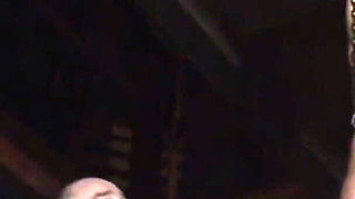 Blonde Girl Has Weights Attached to Her Feet and Is Hoisted up for Whipping