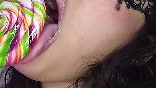 Naughty Latina Playing with Her Pussy and Licking Lollipop