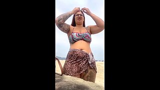 BEACH SEX: YOUNG GIRL TOUCHES GUY'S HARD DICK