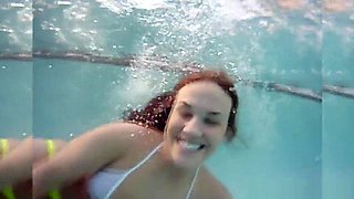 Enema loving babe shows body in pool