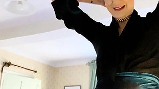 Blonde milf in black stockings masturbates with her dildo