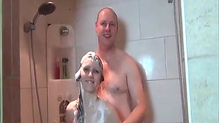 Sexy brunette teen wanks guy's pecker in the bathroom