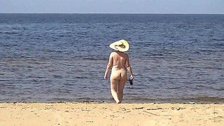 Hot MILF on a Nude Beach.i'm Watching Her.