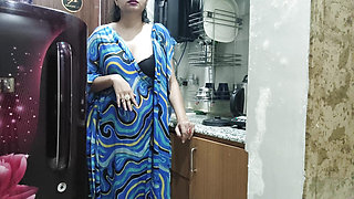 Indian stepmom watches and enters her stepson's Kitchen to fuck him.