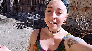 Blonde is flashing her big boobs in the outdoors