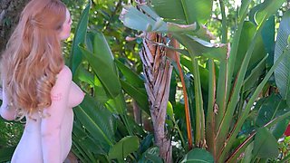 Busty redhead MILF exposes hairy pussy