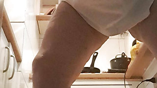 Mom cleans the kitchen floor