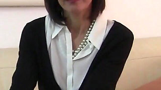 Classy Mature Housewife Emanuelle Plays with Her Hairy Pussy on the Couch