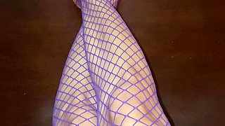 Really sexy legs with tiny feet with long toes in Purple fishnet stocking