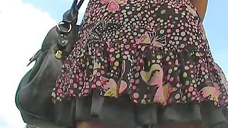 Black thong covers her nub up skirt