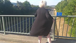 Horny Granny Masturbates on the Highway Bridge