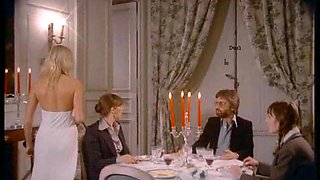 Posh blonde lady gives her clothed man a quick blowjob