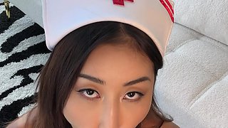 Top-notch Asian nurse seduces and fools around with dildo in hot solo