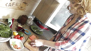 Milf sexy Platinum continues naked cooking in kitchen preparing salad for Christmas without panties  high heels. Naked in public