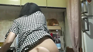 Housewife in the Kitchen with Brush in Pussy