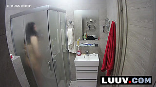 LUUV. A brunette showers, used to amateur cameras, showing her natural body