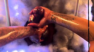 Hot blonde strokes and sucks black cock in glory hole