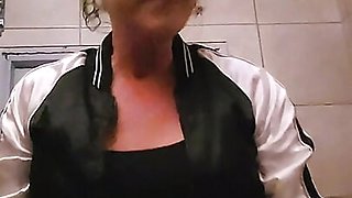 Just a horny milf peeing and masturbating in public bar