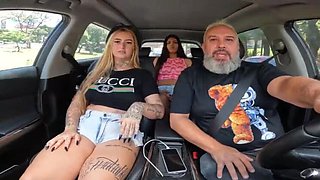 Tatted Blonde Babe Luxx Performs Blowjob in Car During Rush Hour