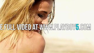 Petite blonde MILF beauty Cara Mell posing nude on the beach