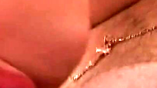 Horny brunette loves a warm load on her tits in close up