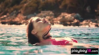 Naked young cutie reveals her sun kissed cunt