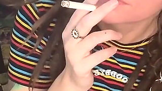 Horny Brunette Smoking and Riding Dildo