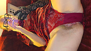 I'm wearing a red dress and I'm wearing red sexy lingerie. I'm excited and I'm starting to masturbate.