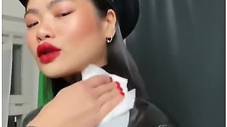 Latex Slave Polishes My Catsuit