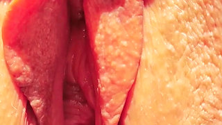Horny mature shows super close up wide open cunt spread.