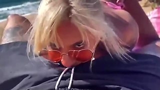 Slutty blonde girlfriend wants to fuck right in the middle of a beach