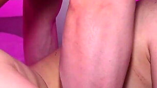 Neon-lit Homemade Video: Red-haired Hottie Takes in Huge Cock and Gets a Creampie