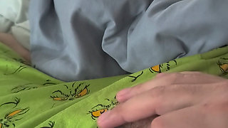 Cute handjob on the bed with a hard and erect penis