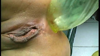 Stockinged brunette seducing her holes with sex toys, food and bottles