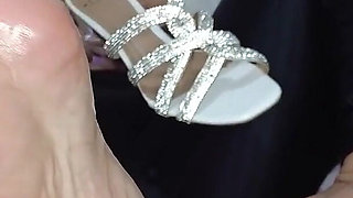 Latina Doing Oiled Footjob Wearing Shiny High Heels on Her Sexy Feet