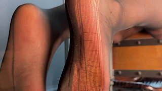 Watch Me Tease You with My Ripped Nylon Feet Through the Glass
