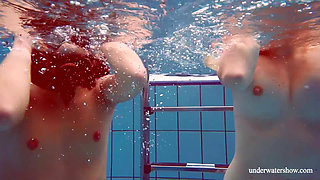 Blonde and Brunette babes swim naked