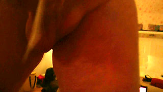 Swemature in a dark hotel corridor, pleasuring herself with a big black dildo, sucking and jerking cock.