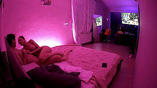 Kamila and Danildo cuddling in bed