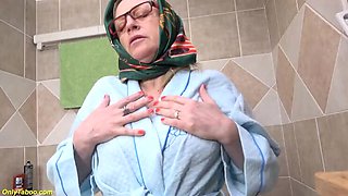 Mature MILF toys her tight asshole while her cervix prolapses