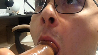 College boy sucks daddy's cock until he cums in his mouth (dildo)