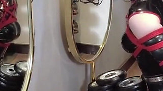 Mz30 - Latex Girl, Bound by Red Rope, Admiring Herself in Front of a Mirror