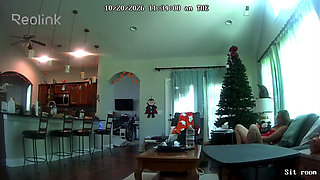 Camera catches MILF playing with pussy on couch