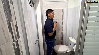 Teacher his student in the bathroom.