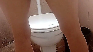 Hot Girl Slut Masterbation with Pink Vibrator in Toilet Mini Skirt