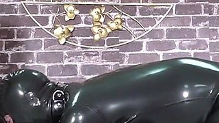 Rubber Gimp Is Spitroast