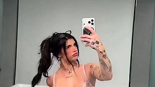 Big boobed webcam MILF shaving her pussy in the shower