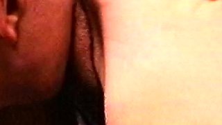 Busty brunette sucks and licks big cock in a close up